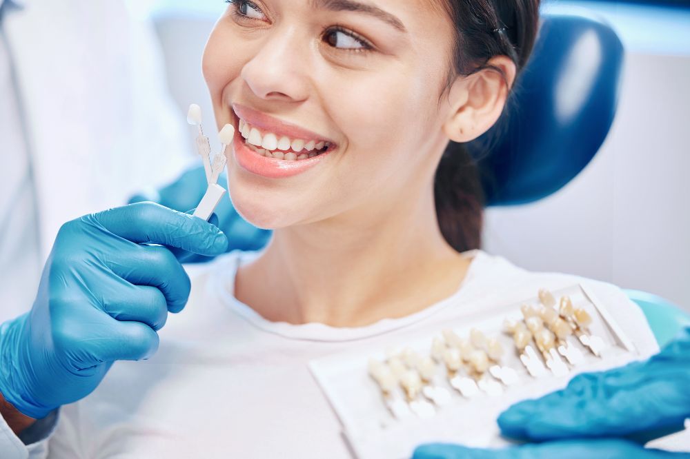 a woman is getting dental treatment.